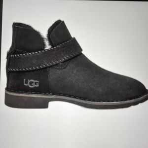 UGG McKay Skeepskin, fur lined  Black bootie.  NEW